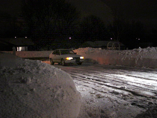 From 2003, a picture of our old 1994 Saab 900 SE in the driveway after snow 